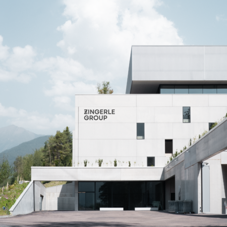 The headquarters in Italy consists of a production hall and an office building.