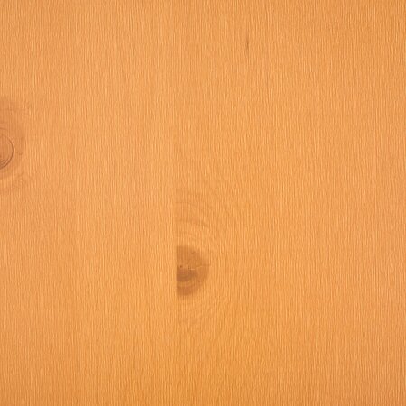 The wooden top of the beer garden table sets in pine.